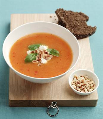 Sweet potato soup with goats cheese and pinenuts