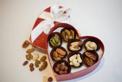 Nuts for 'Valentine's Day' give a handful love with almonds, brazil nuts, cashew